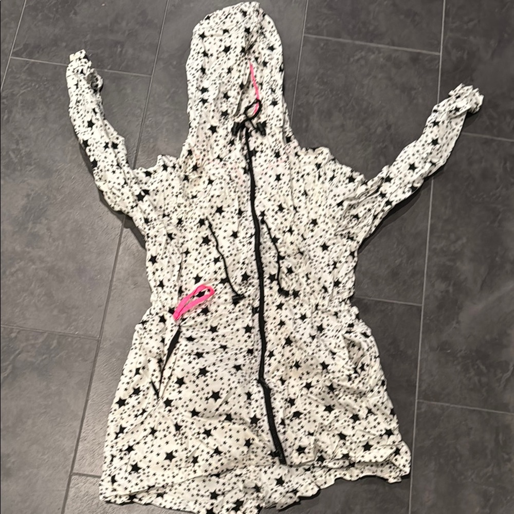 Star Pattern Hooded Jacket that’s folds into a bag festival jacket